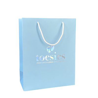 Ein guter Preis. Druckblaue Papierluxusfördermaschine sackt das Kleid ein, das mit Hologramm-Logo verpackt Online